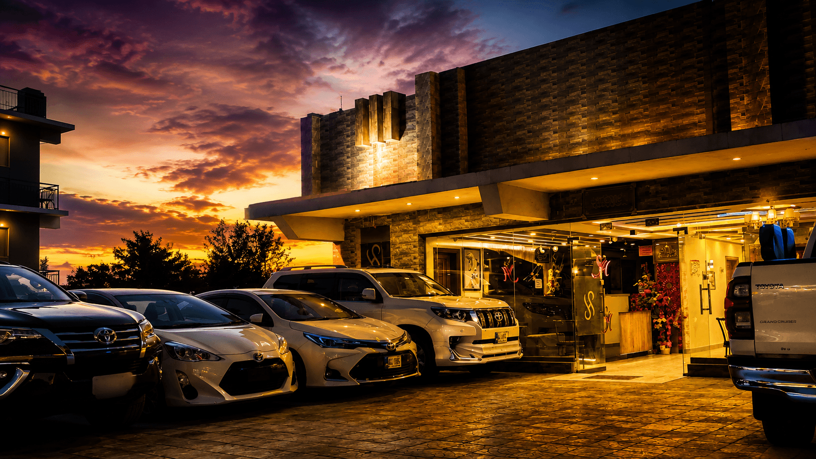 Second Home Hotel exterior at golden hour